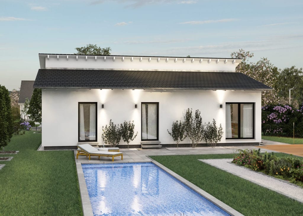 Fertighaus Bungalow comfortstyle von massa haus mit elegantem Flachdach, großen Fensterflächen, stilvoller Außenbeleuchtung und privatem Pool im gepflegten Garten – modernes Wohnen auf einer Ebene.
